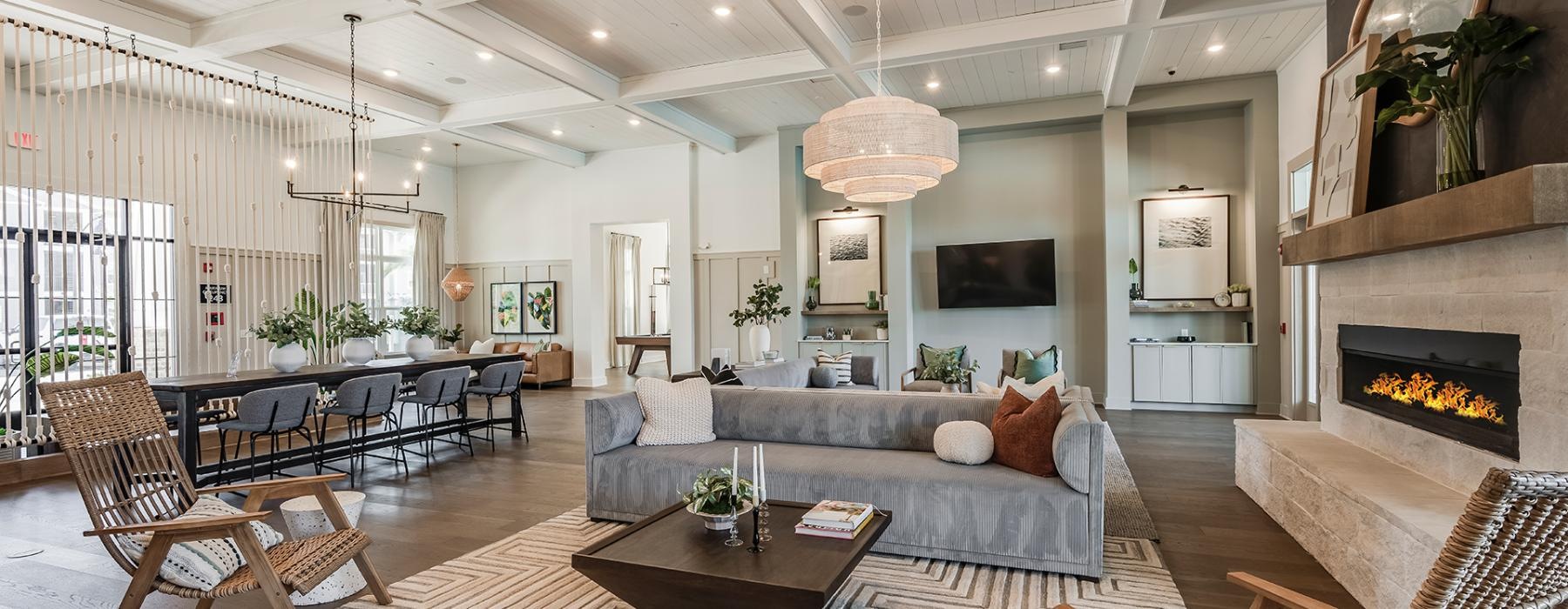 a large living room with a fireplace